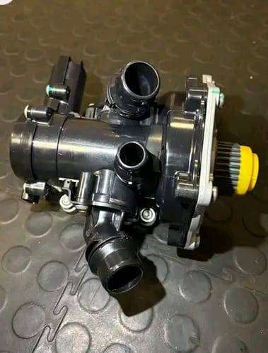 VW Golf 7 GTI / Audi A4 A5 Water Pump and Housing Thermostat - New