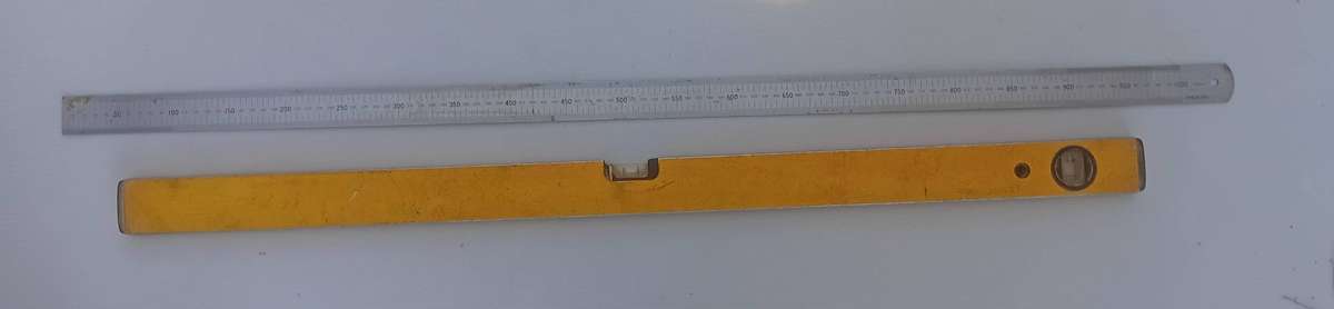 Spirit level and steel ruler