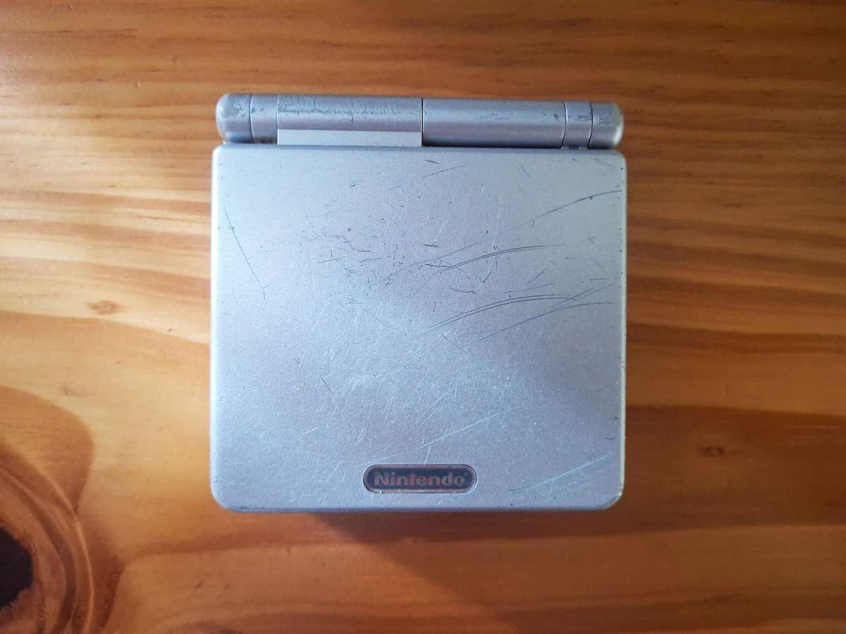 Nintendo Game Boy Advance SP with Charger, USB Cable & Game - Some Cosmetic Scratches