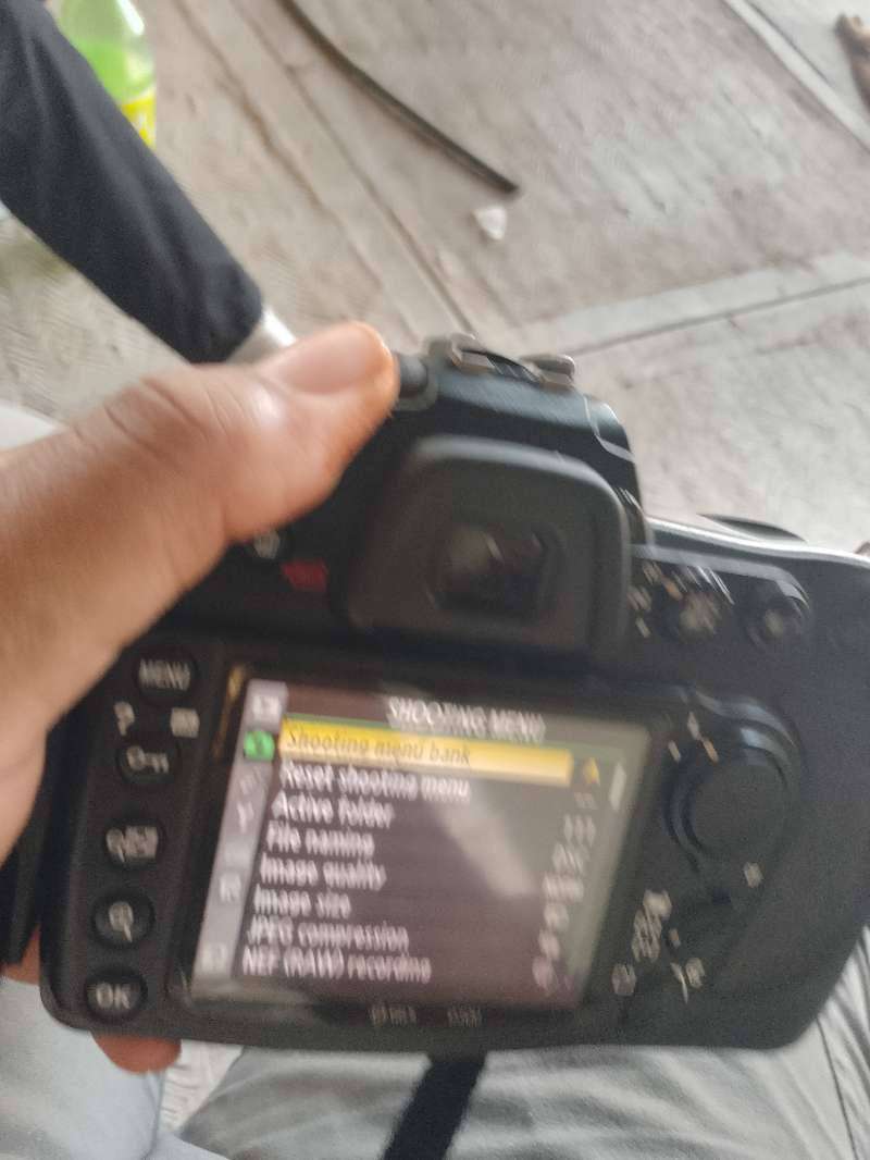 Nikon DSLR Camera with Lens and Charger - Secondhand