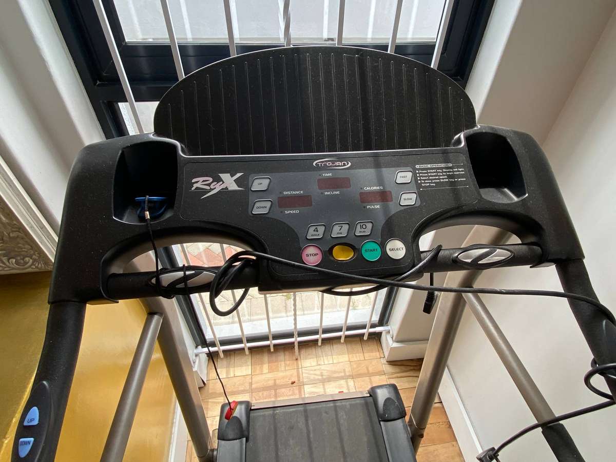 black and grey Trojan RunX Treadmill featuring an electronic console with digital LED displays for t