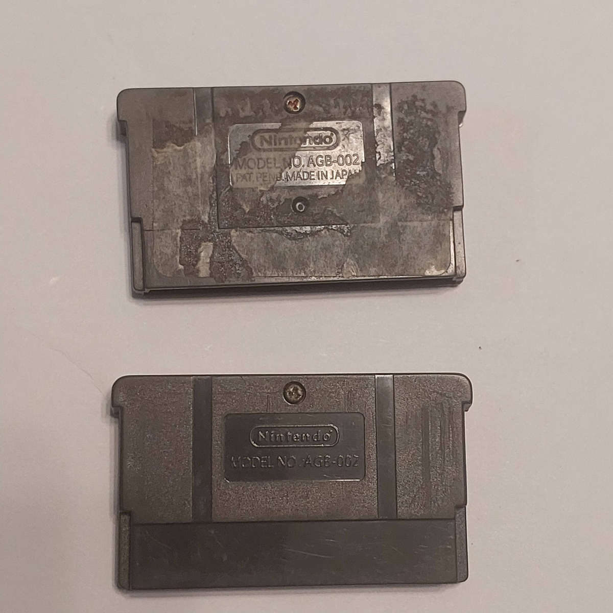 Game Boy Advance (Not Working) + Pouch (Dirty) + 2Games ( Suspect not original)