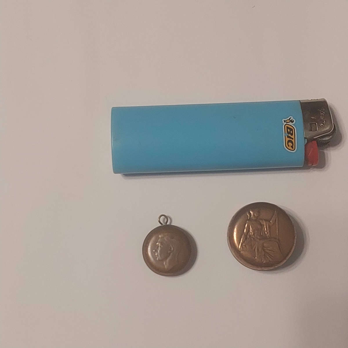 Snuff box and small pendant made from old coins