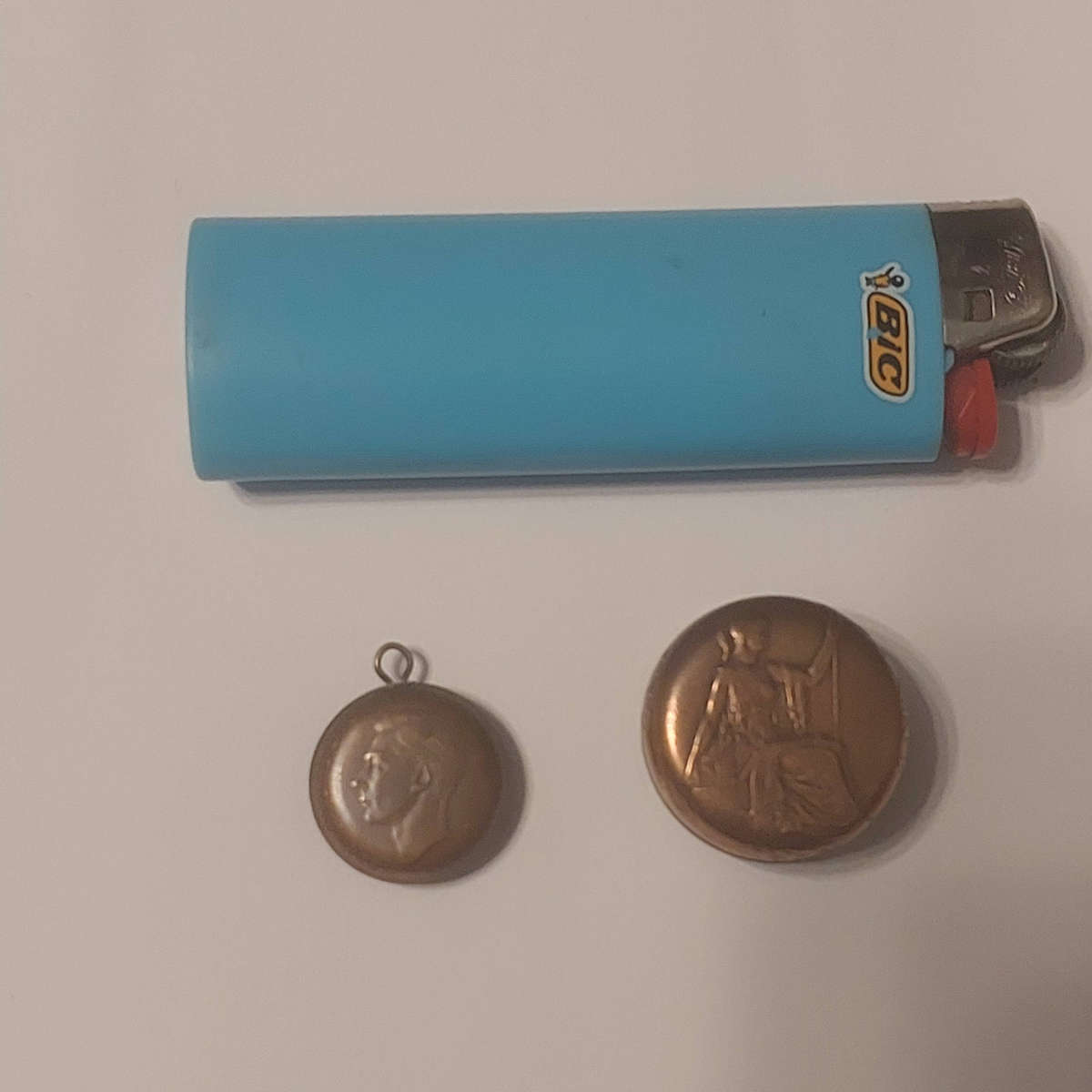 Snuff box and small pendant made from old coins