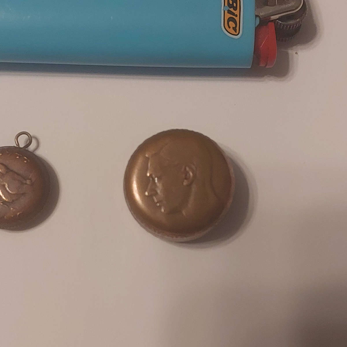 Snuff box and small pendant made from old coins