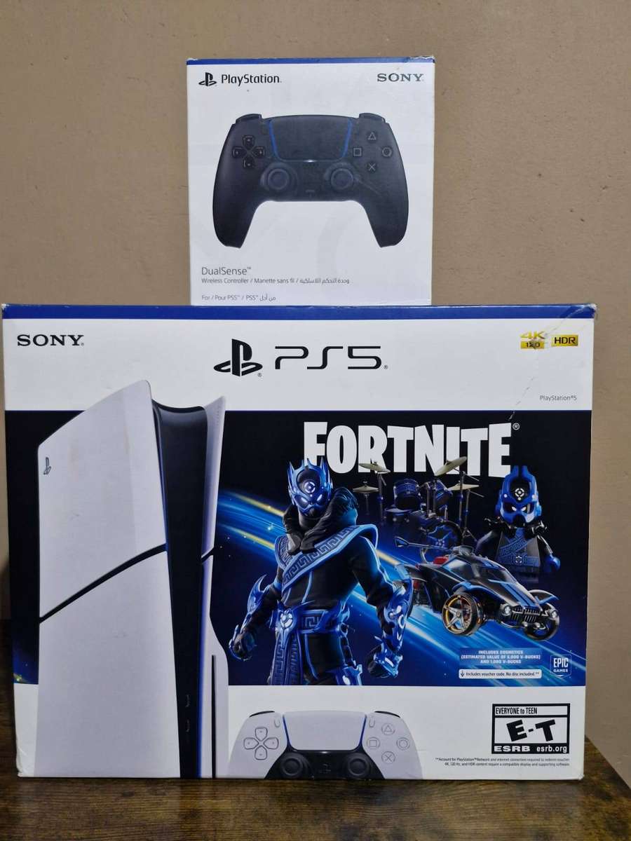 PlayStation 5 1TB + 2 DualSense Controllers + 4 PS5 Games and 15 PS 4 Games