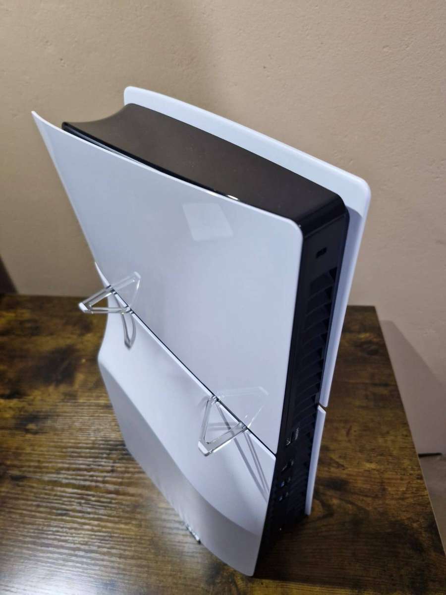 PlayStation 5 1TB + 2 DualSense Controllers + 4 PS5 Games and 15 PS 4 Games