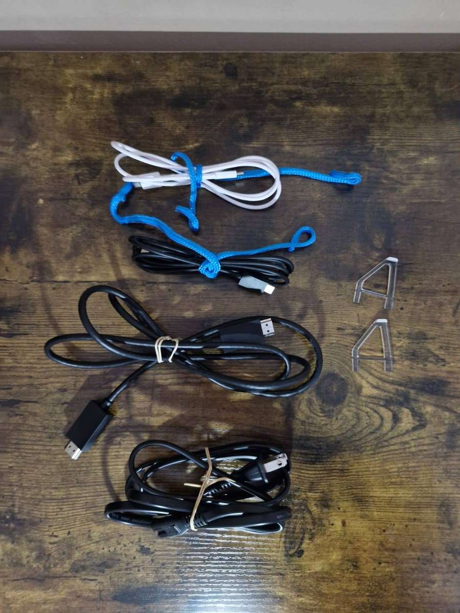 PlayStation 5 1TB + 2 DualSense Controllers + 4 PS5 Games and 15 PS 4 Games