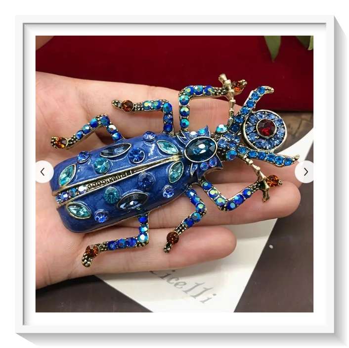 An Outrageous Over the Top Large Blue Glitter Bug Brooch Covered in Rhinestones - For Men or Women