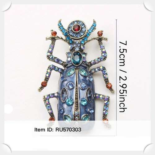 An Outrageous Over the Top Large Blue Glitter Bug Brooch Covered in Rhinestones - For Men or Women