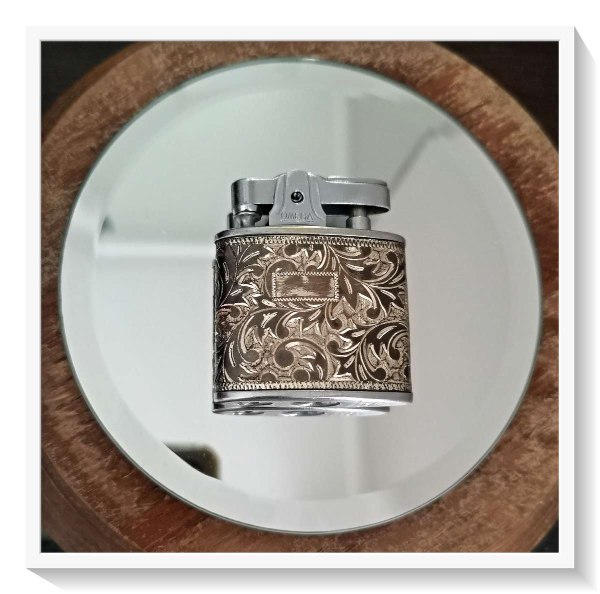 Vintage Paisley Silver and Gold Omega Lighter in Good Condition