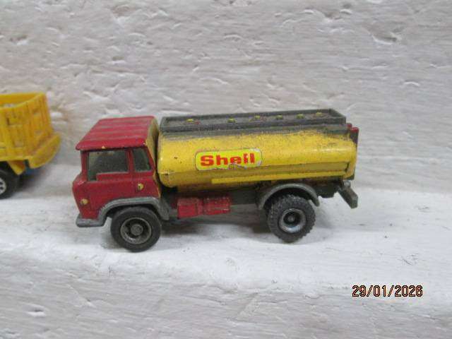 HO SCALE - VARIOUS TRUCKS AND A BULLDOZER