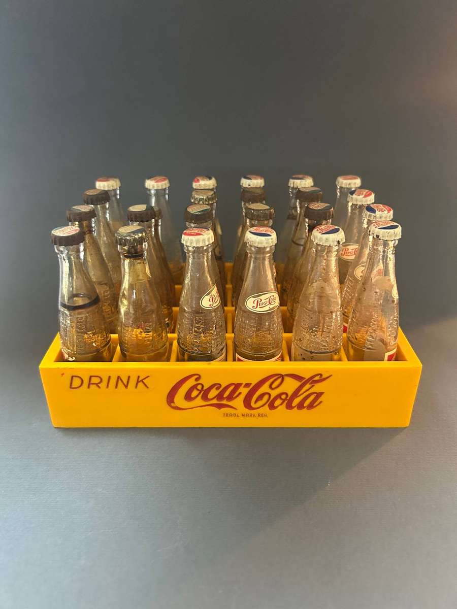 Coca Cola crate with Pepsi bottles