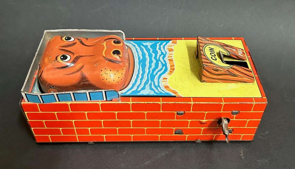 Tin plate wind up money bank made in Japan