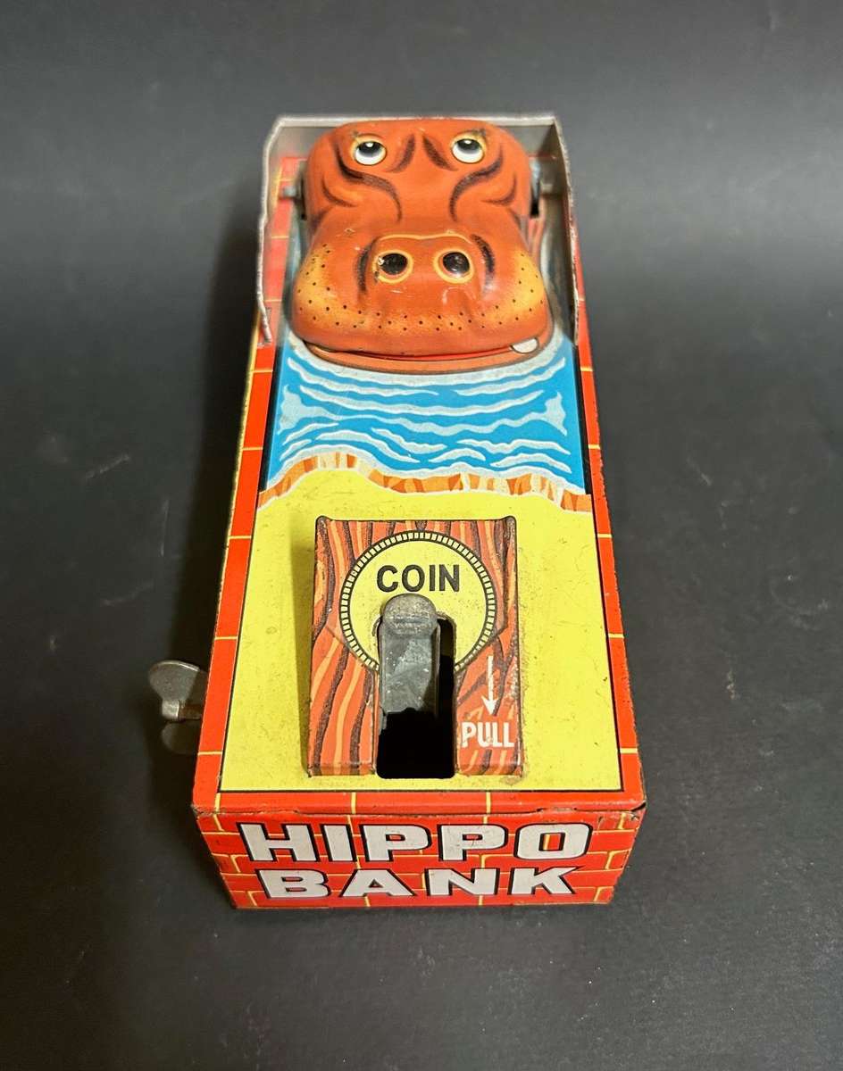 Tin plate wind up money bank made in Japan