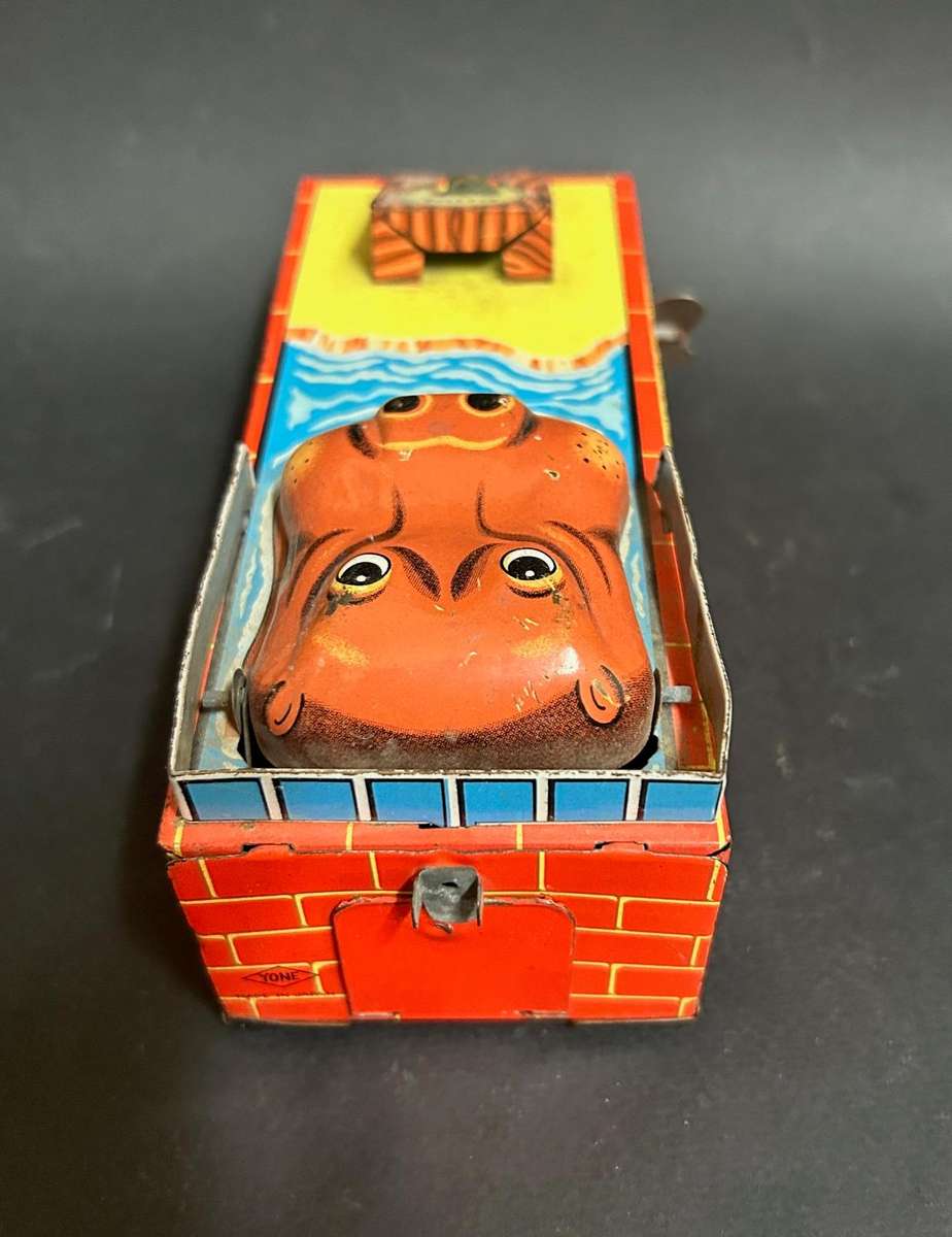 Tin plate wind up money bank made in Japan