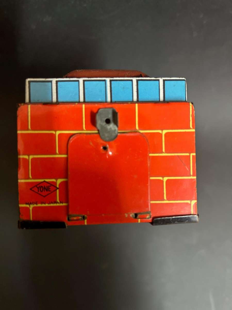 Tin plate wind up money bank made in Japan