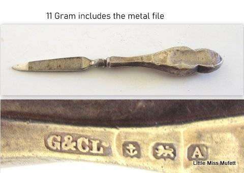 2 Hallmarked silver items and one ,875 silver item