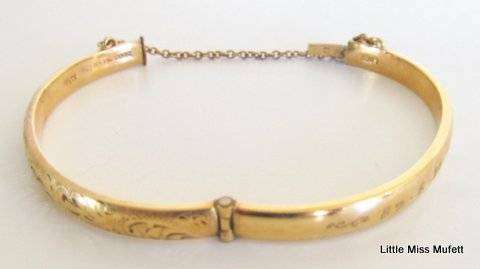 A 9ct Gold metal core childs bangle--Weight 6 gram. Approx 1,2 gram pure 9ct gold