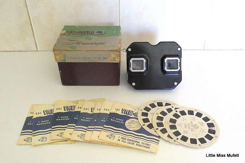 A Viewmaster with 11 reels including 3 Disney reels. Mickey Mouse,Donald Duck and Peter Pam