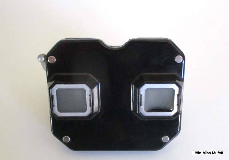 A Viewmaster with 11 reels including 3 Disney reels. Mickey Mouse,Donald Duck and Peter Pam