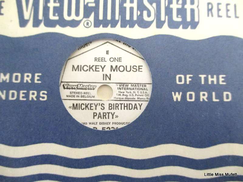 A Viewmaster with 11 reels including 3 Disney reels. Mickey Mouse,Donald Duck and Peter Pam