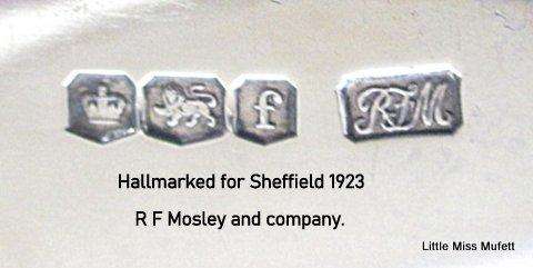 A Hallmarked silver  knife 1923 with a mother of pearl handle---R.F. Mosley and company