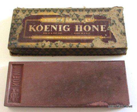 A Koenig Hone cut throat razor sharpening stone along with another stone