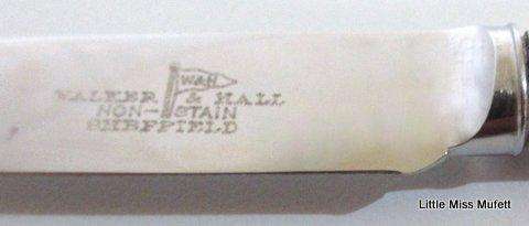 A Set of Fruit knives with hallmarked silver collars and mother of pearl handles--Boxed