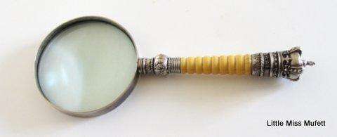 An Antique magnifier and letter opener