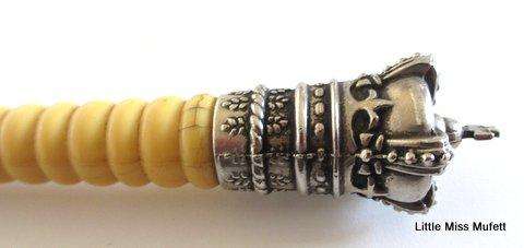 An Antique magnifier and letter opener