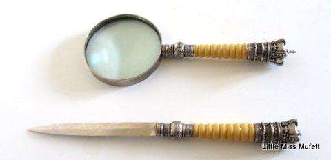 An Antique magnifier and letter opener
