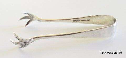 A Hallmarked silver sugar snipper and a Hallmarked silver thimble--Total weight 25 gram