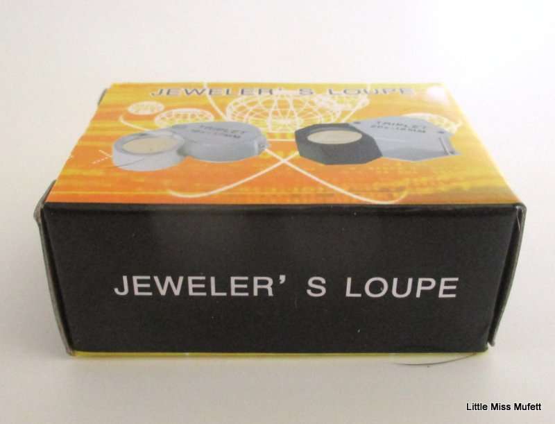 A JEWELLERS MAGNIFYING LOUPE ---NEW