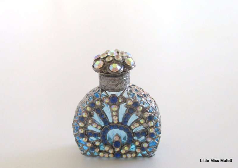 A czechoslovakia  glass perfume bottle with silver tone overlay--Perfect