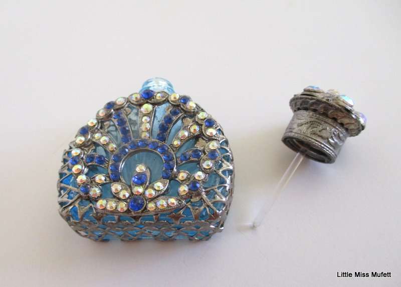 A czechoslovakia  glass perfume bottle with silver tone overlay--Perfect