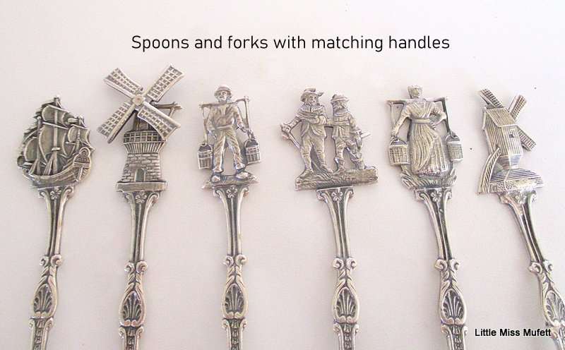 A SET OF SIX DECORATIVE DUTCH  CAKE SPOONS AND MATCHING FORKS