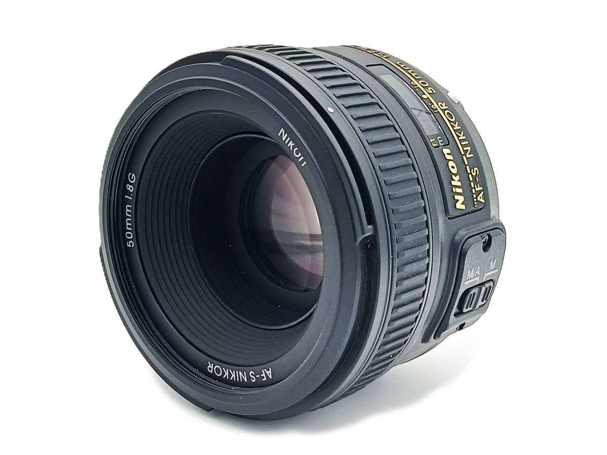 Nikon AF-S Nikkor 50mm 1.8G with Caps, Lens Hood, Hoya UV Filter and original Nikon Bag