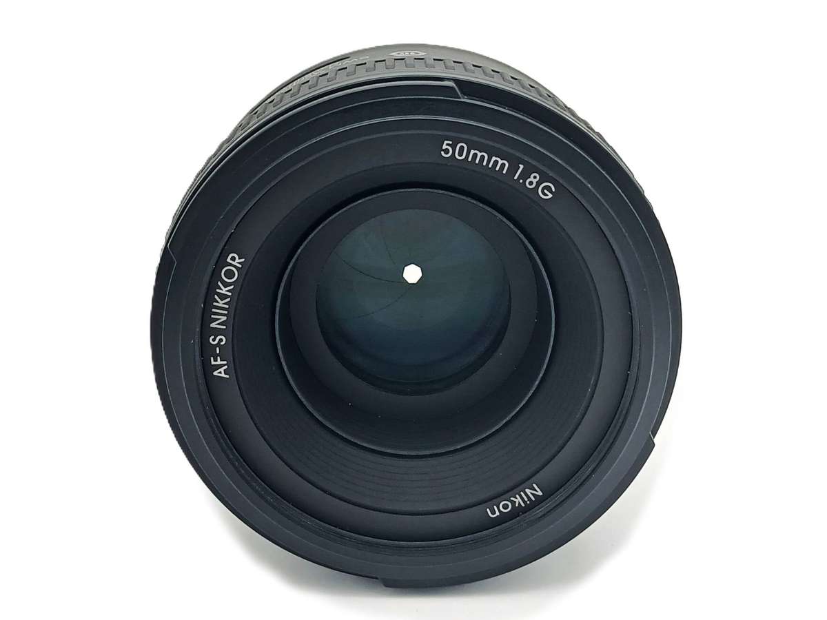 Nikon AF-S Nikkor 50mm 1.8G with Caps, Lens Hood, Hoya UV Filter and original Nikon Bag