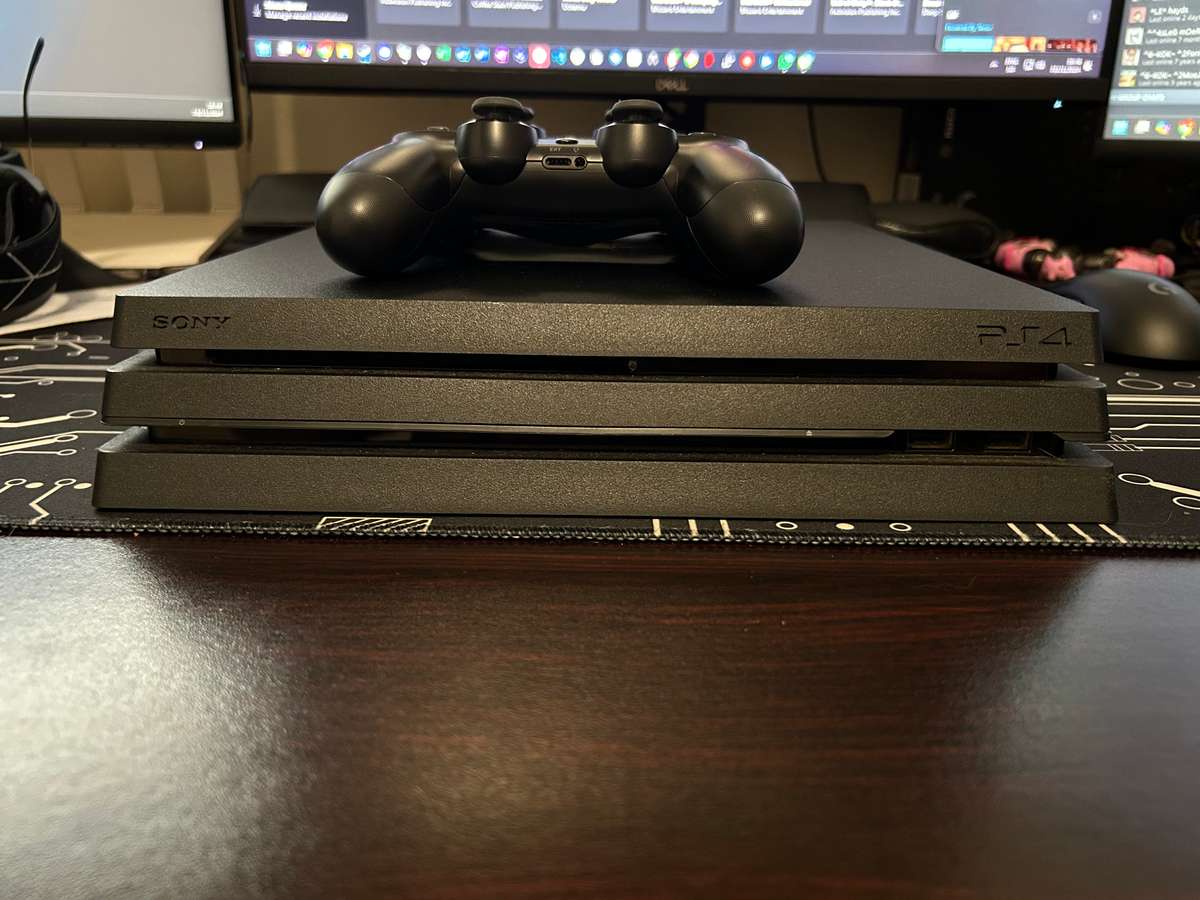 PS4 Pro 1TB Excellent Condition with 2 PS4 Controllers