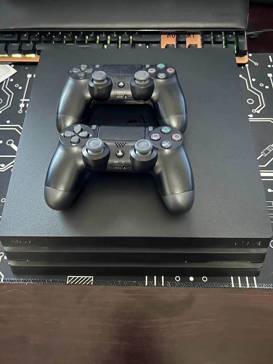 PS4 Pro 1TB Excellent Condition with 2 PS4 Controllers