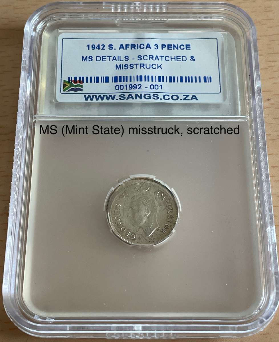 Rare misstruck (extra rare broadstruck?) graded 1942 SA tickey 3d.