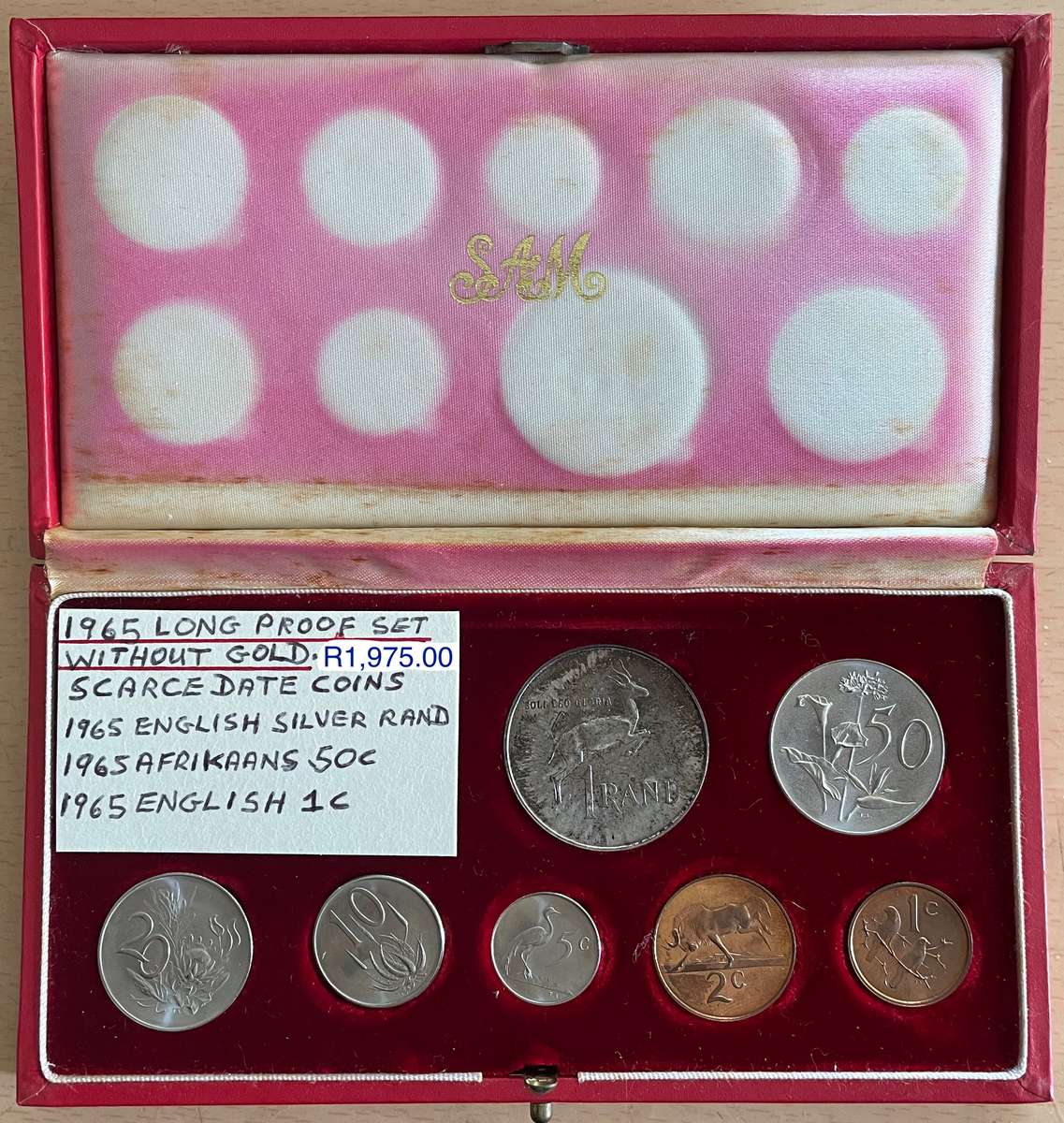 1965 SA short Proof set in a red box. Has scarce Silver Rand, 50c, and 1c, no gold.
