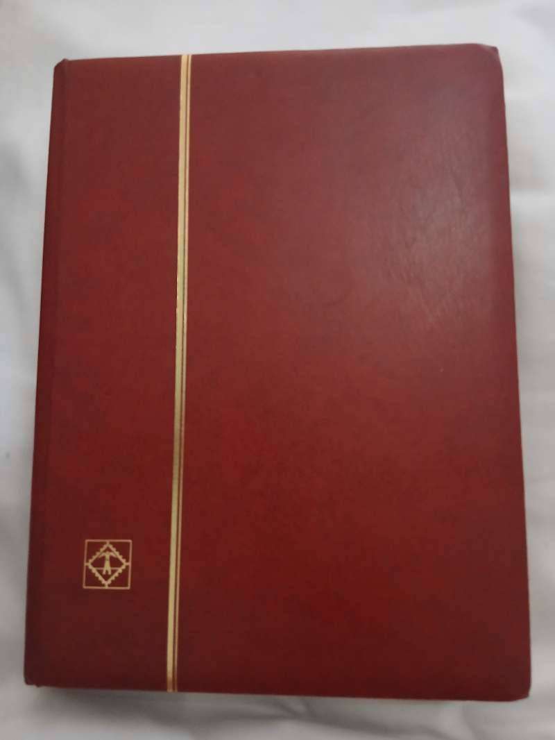 Empty stamp stock book, 15 pages, 2 sides each.