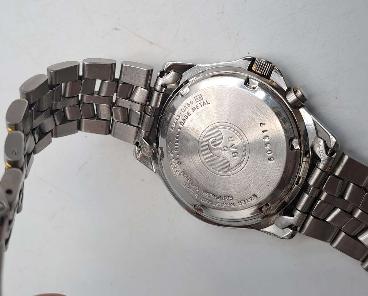 Vintage Seiko Kinetic SQ 50 Men's Watch -Luminated Dial-Not holding Charge