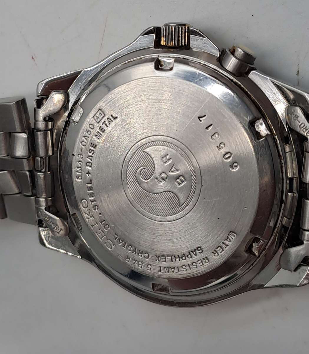 Vintage Seiko Kinetic SQ 50 Men's Watch -Luminated Dial-Not holding Charge