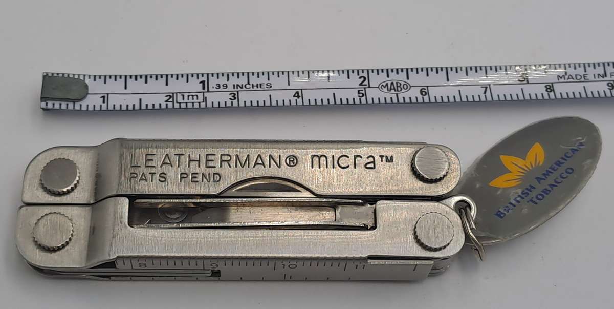 Vintage Leatherman Micra Multitool with British American Tabacco August 1999 Tag