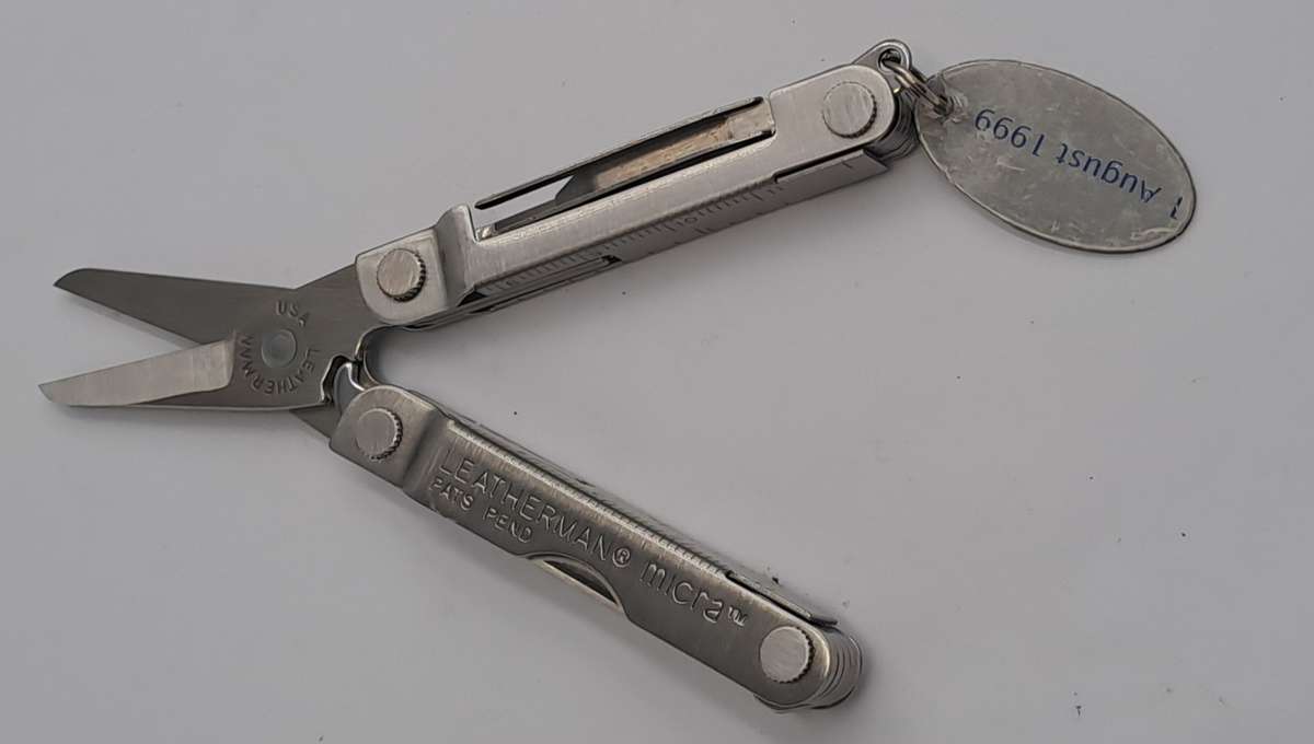 Vintage Leatherman Micra Multitool with British American Tabacco August 1999 Tag