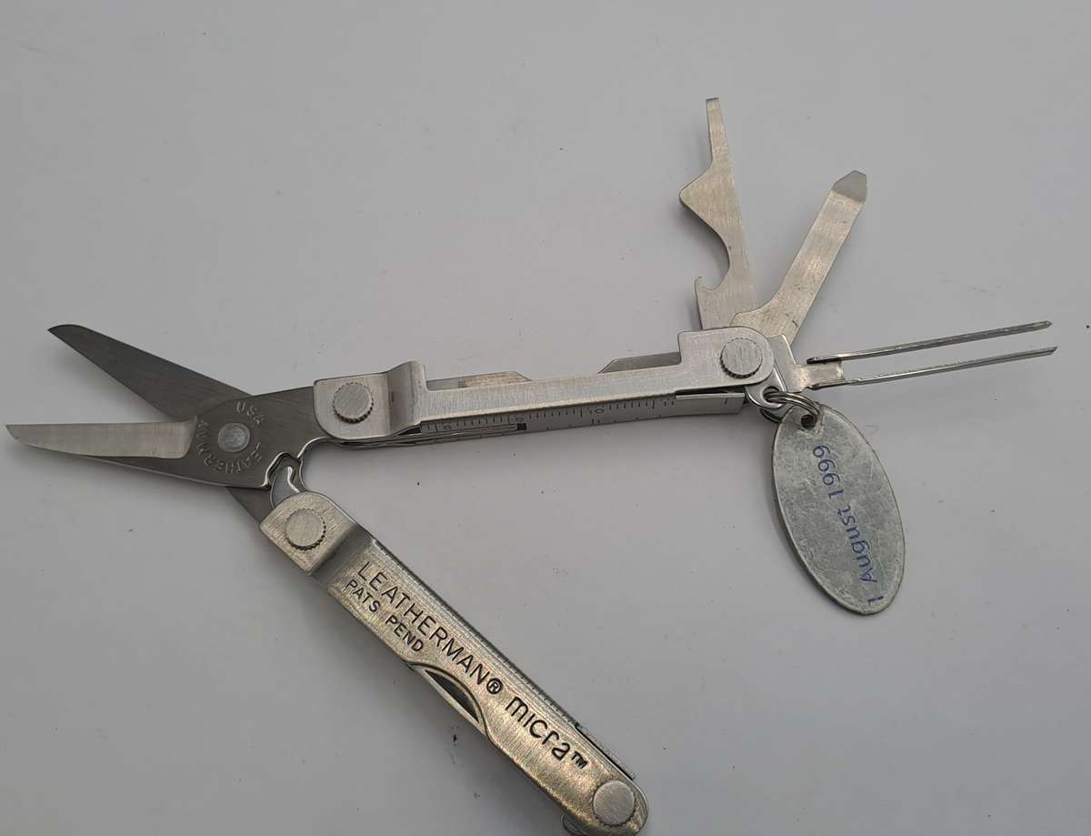 Vintage Leatherman Micra Multitool with British American Tabacco August 1999 Tag