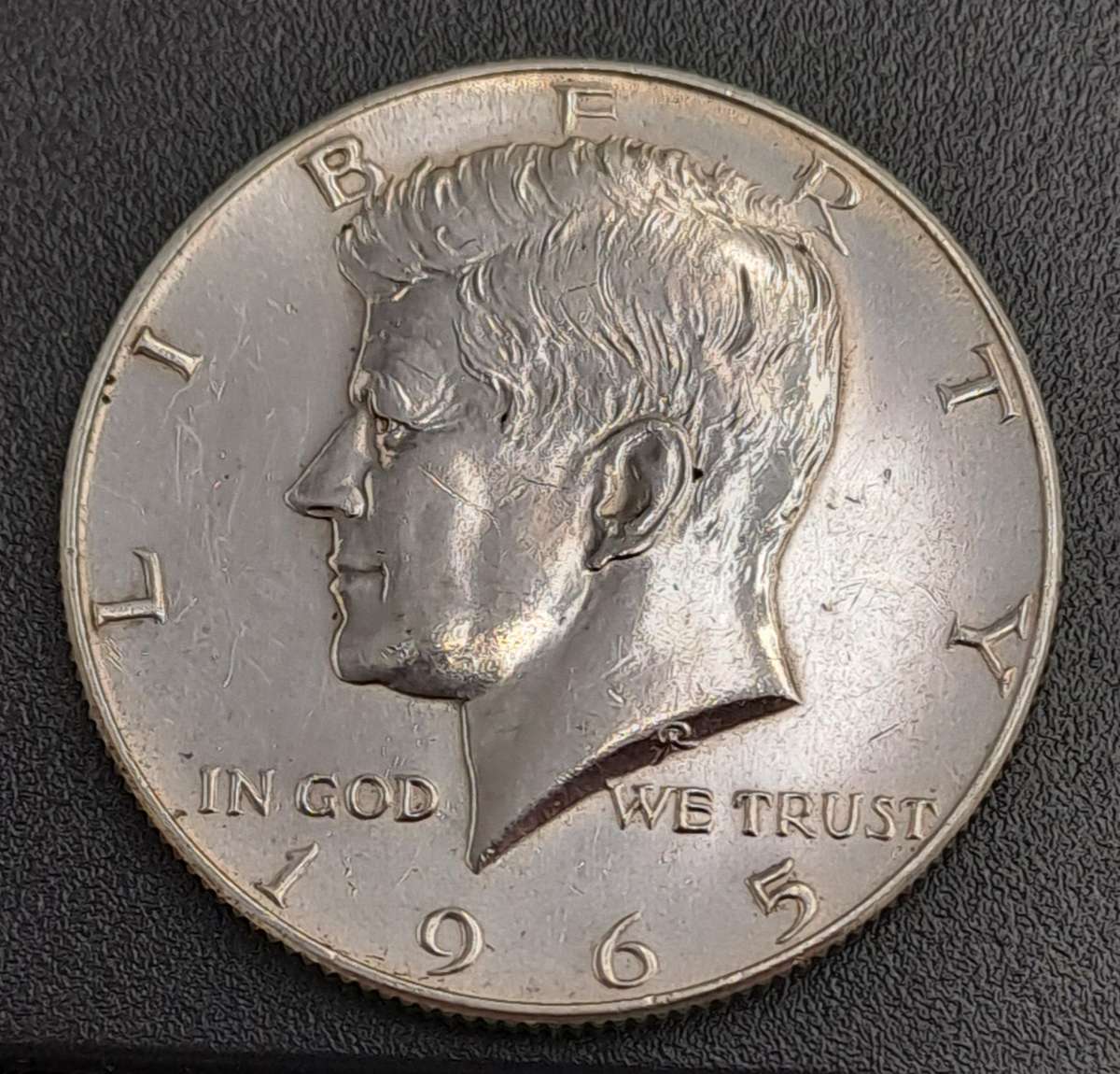 1965   United States  ½ Dollar "Kennedy Half Dollar" 40% Silver